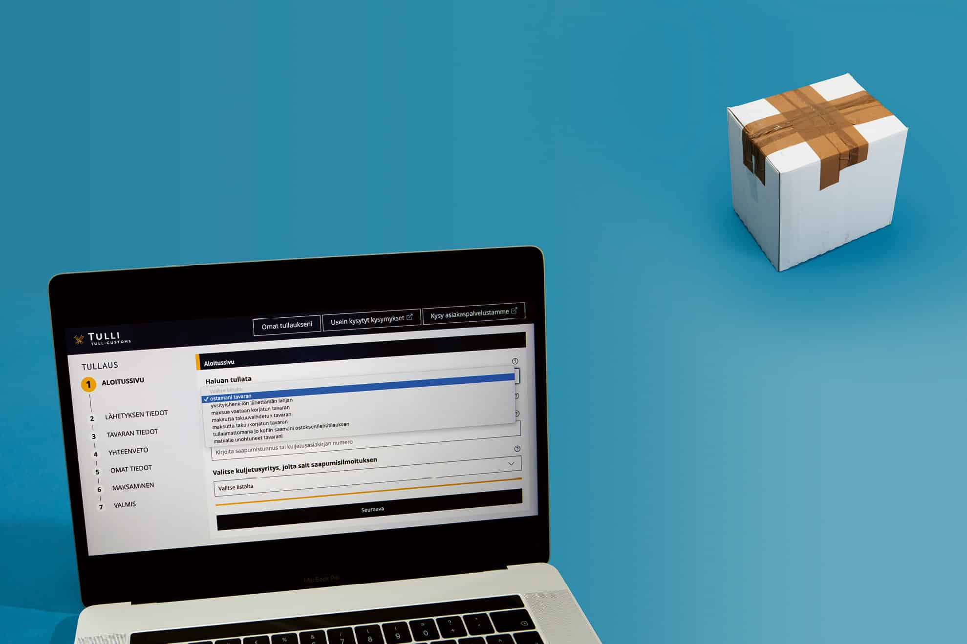 Tietokone ja paketti.